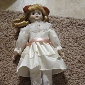 Elegant Doll With White Dress And Pink Bow